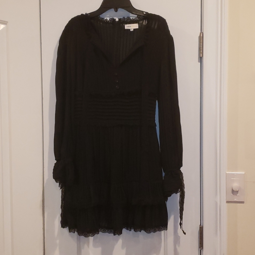 Black dress by Carmella M